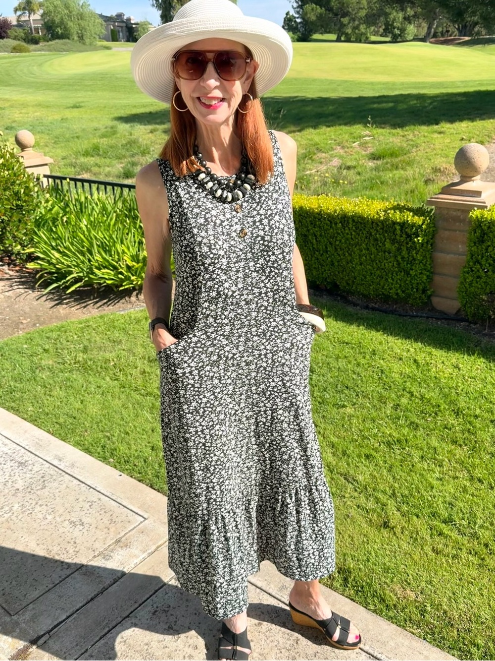 Sleeveless Black & White Floral Midi Dress with Side Pockets